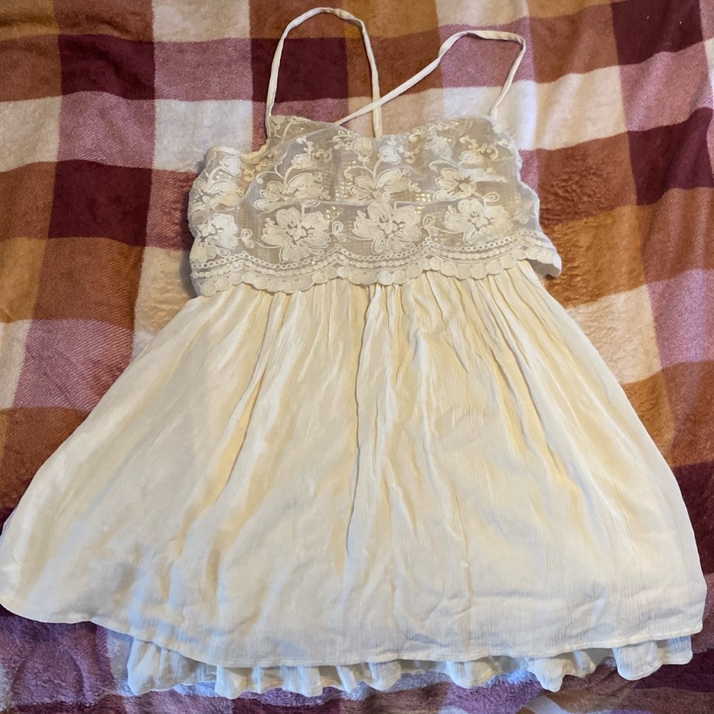 It fits very nice and perfect for wearing with cute shorts or some nice jeans.
